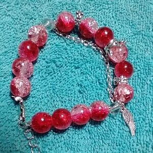 Silvertone red and clear feather crown flower  stretch cracked glass bracelet